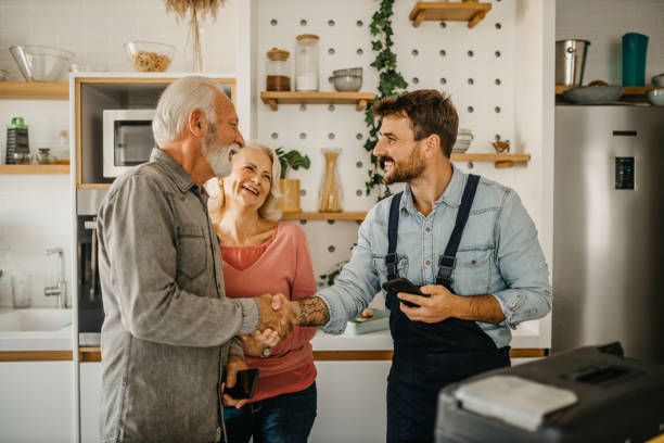 A man shaking hands with client | Fort Myers, FL | Emerald Green