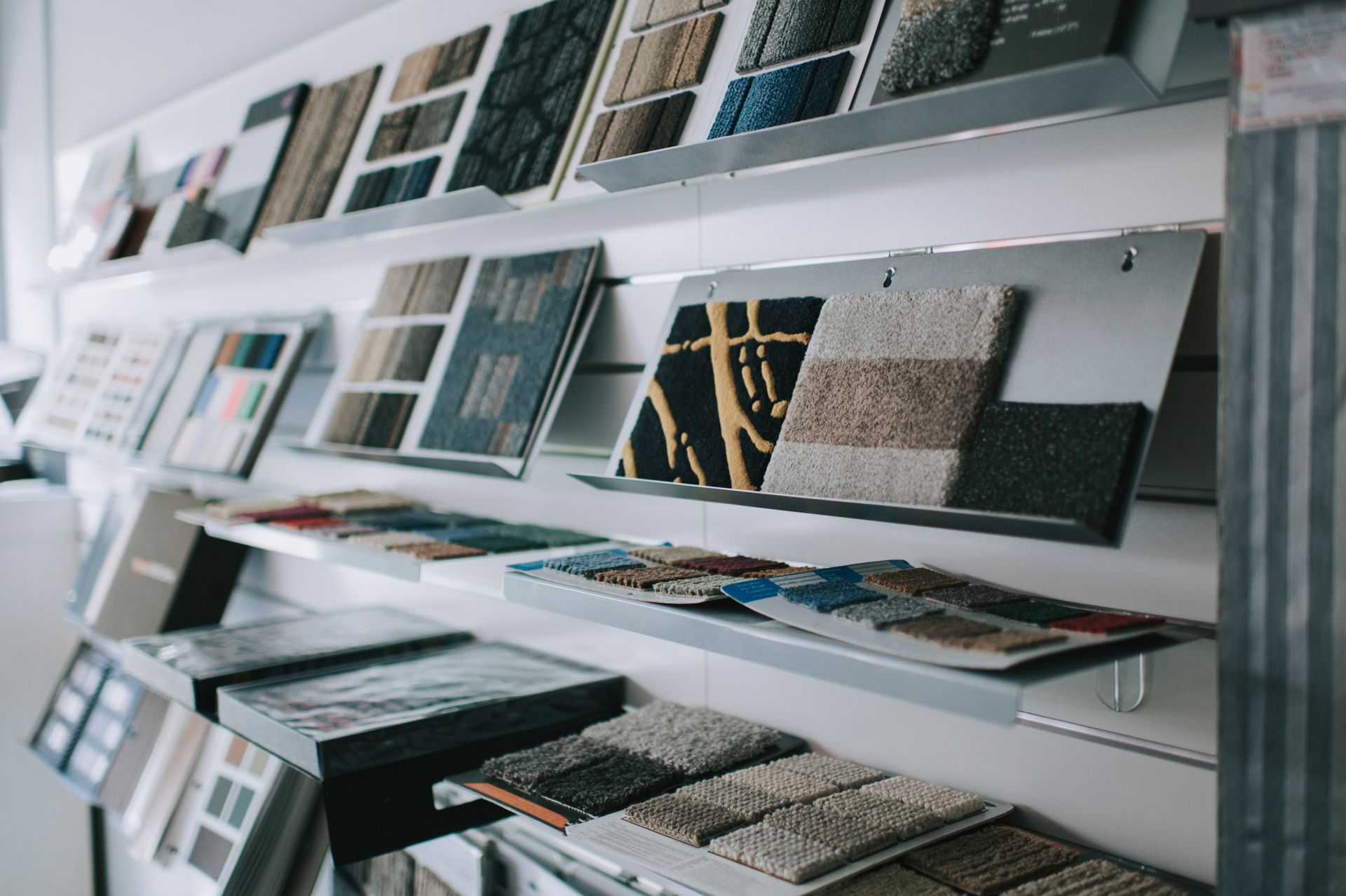 A display of carpet samples on shelves in a store - Lawton, OK - LJ's Floor Covering
