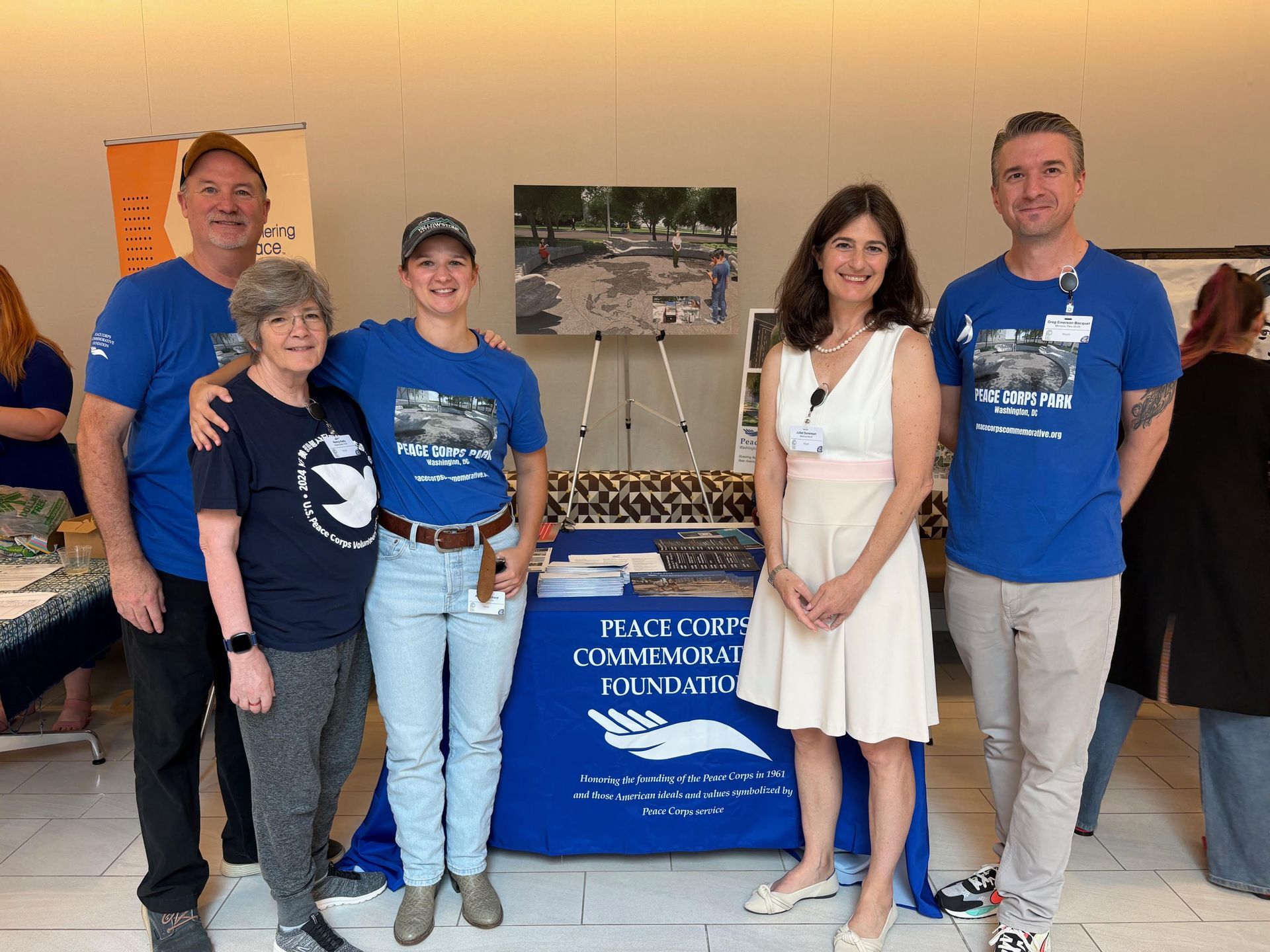 Members of the Peace Corps Park team (in the blue shirts, from left: Glenn Blumhorst, Nancy Kelly, Arianna Richard, Greg Emerson) with Juliet Sorensen at the Peace Corps Connect conference in July 2025.