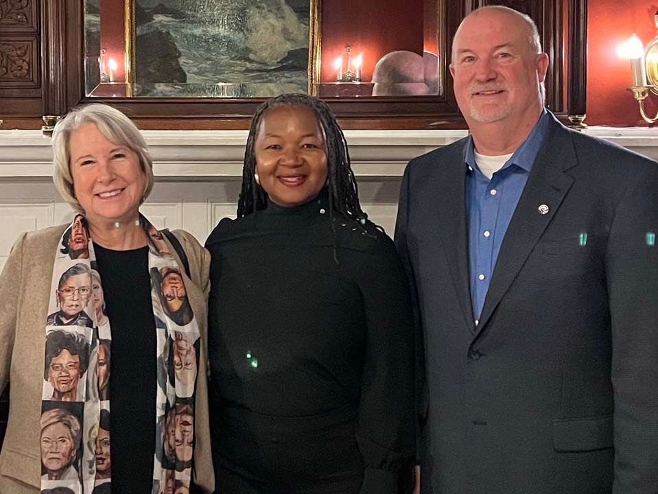 Former Peace Corps Director Carrie Hessler-Radelet (2014-17) with GWCF's Tonia Wellons  and Glenn Blumhorst, Chief Advancement Officer of the Peace Corps Commemorative Foundation