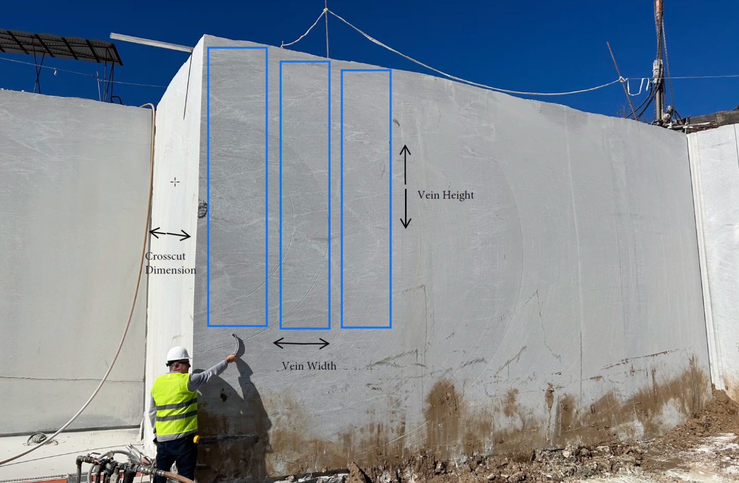 An image of the Silver Cloud granite with overlayed markings showing how the blocks for Peace Corps Park will be oriented and cut.