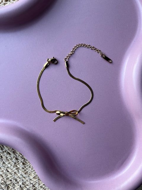 Armband strikje goud of zilver