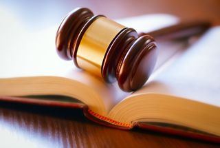 Criminal Law — Justice Mallet Over A Book in Evansville, IN
