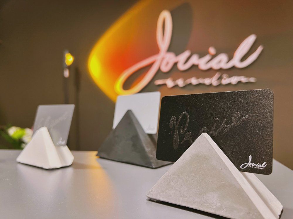 A card holder with the word please written on it