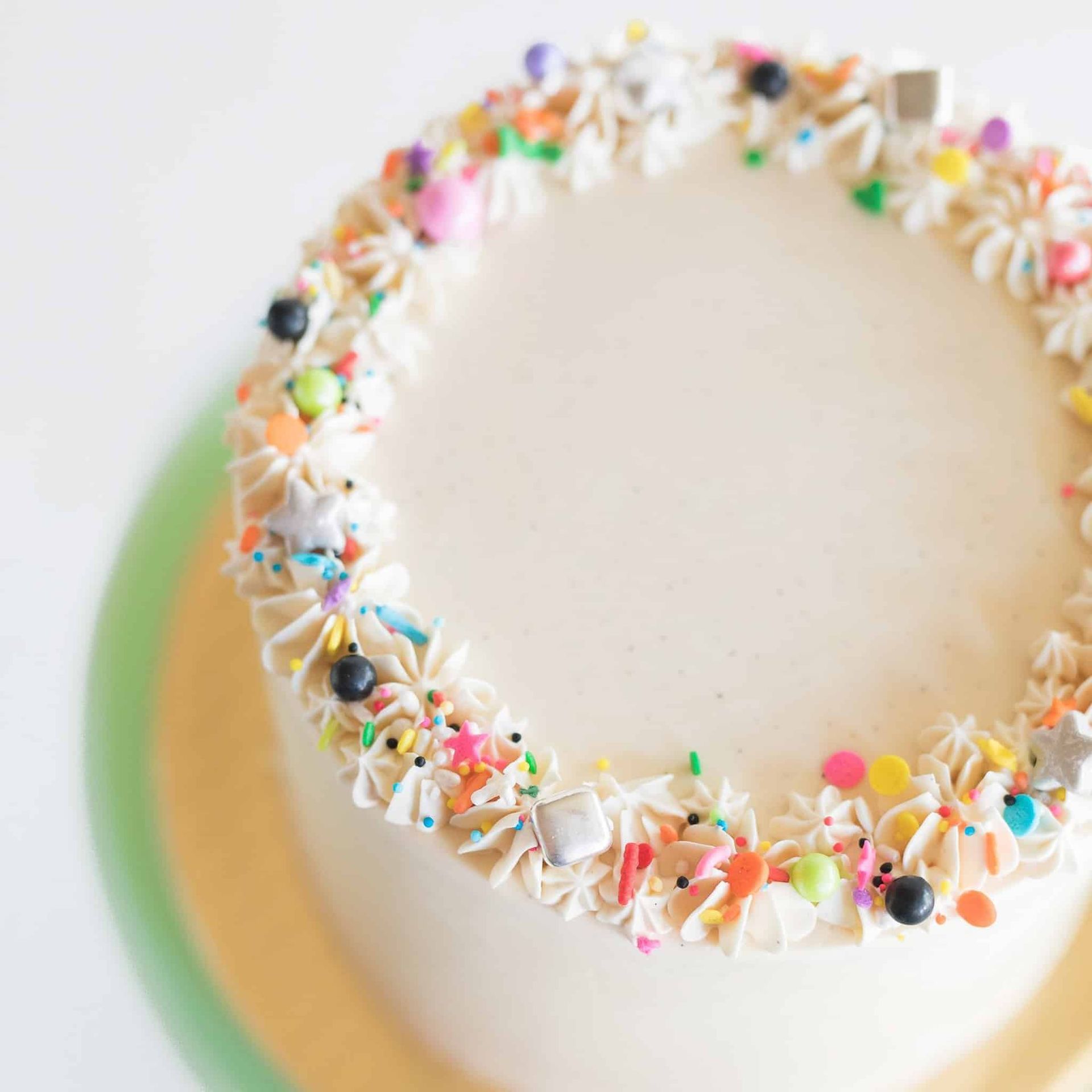 The bride is wearing a fur shawl and holding a bouquet of flowers.