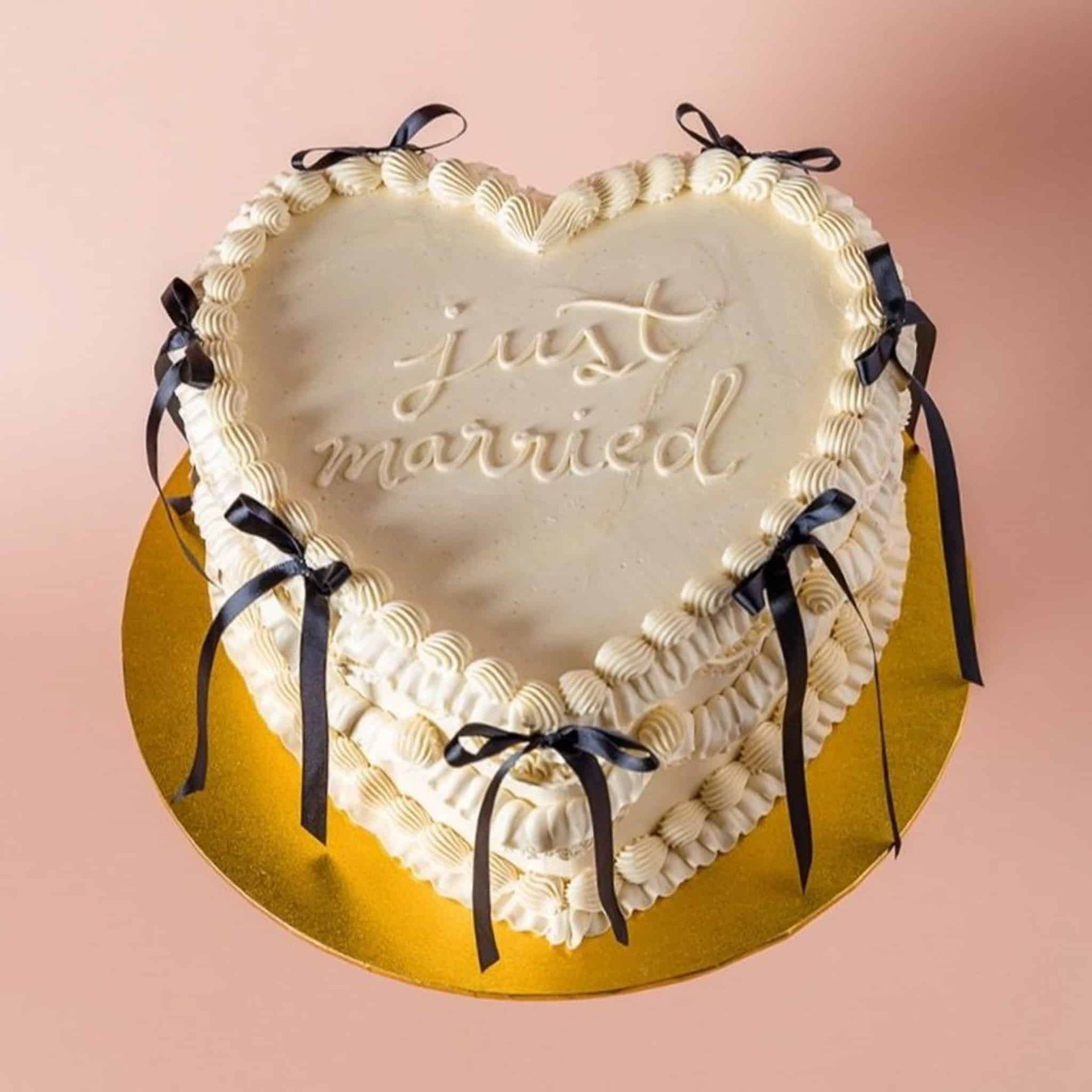 A woman in a white dress is holding a bouquet of flowers.