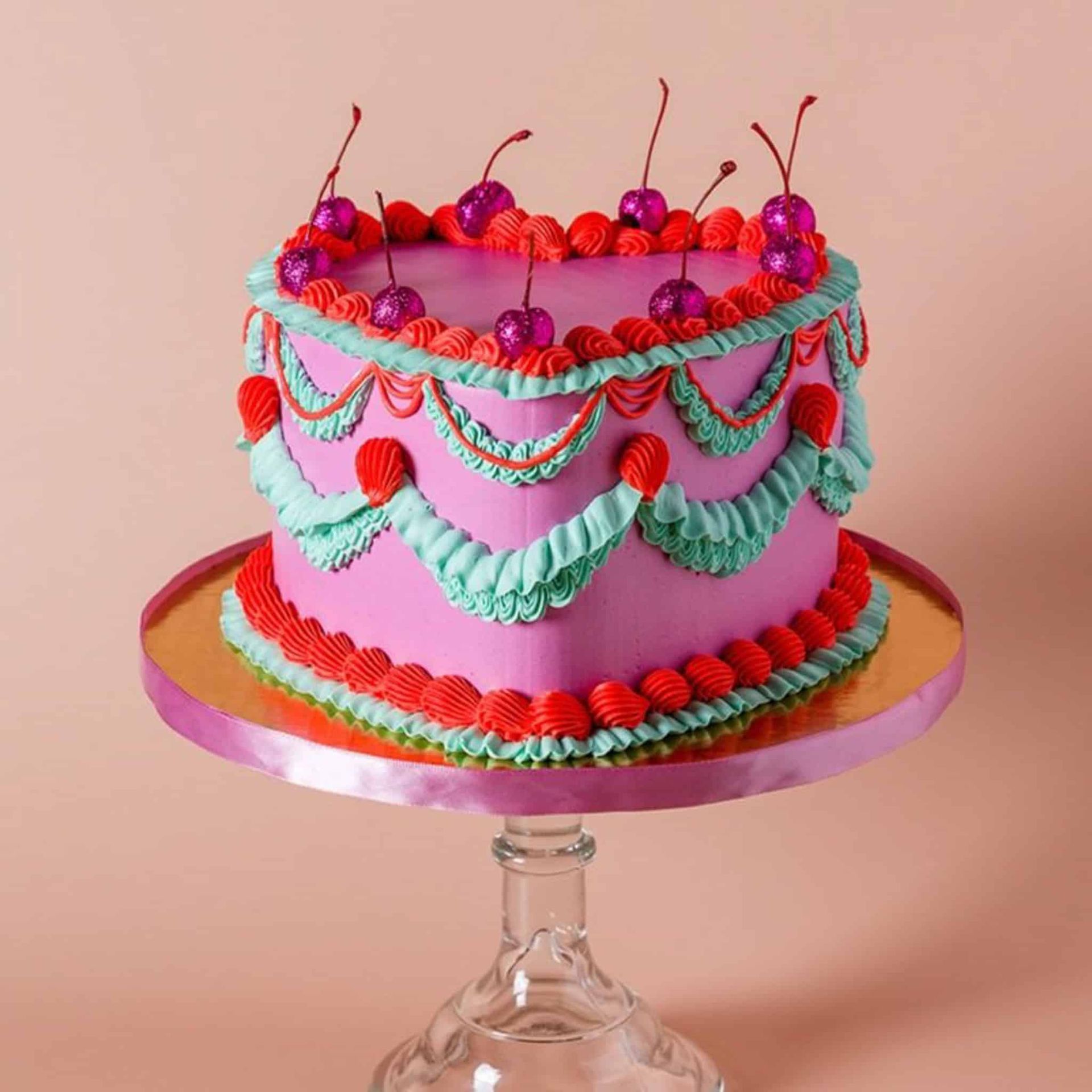 A bride and groom are holding a bouquet of flowers.