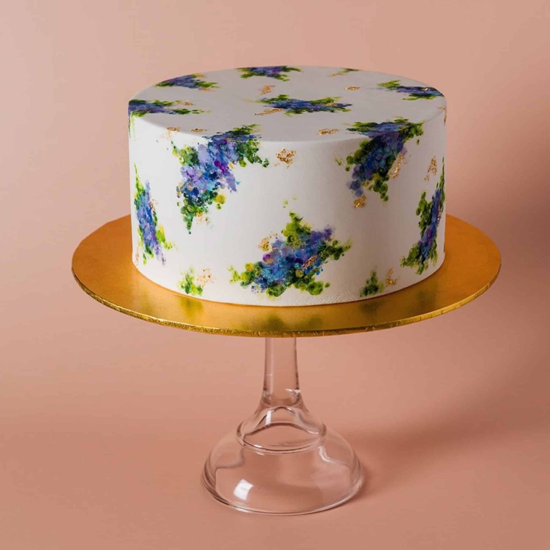 A bride in a wedding dress is holding a bouquet of flowers.