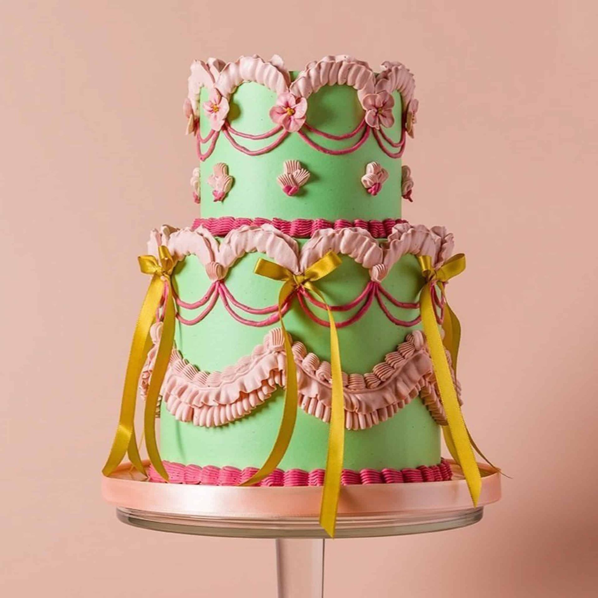 A bride and groom are holding a bouquet of flowers.