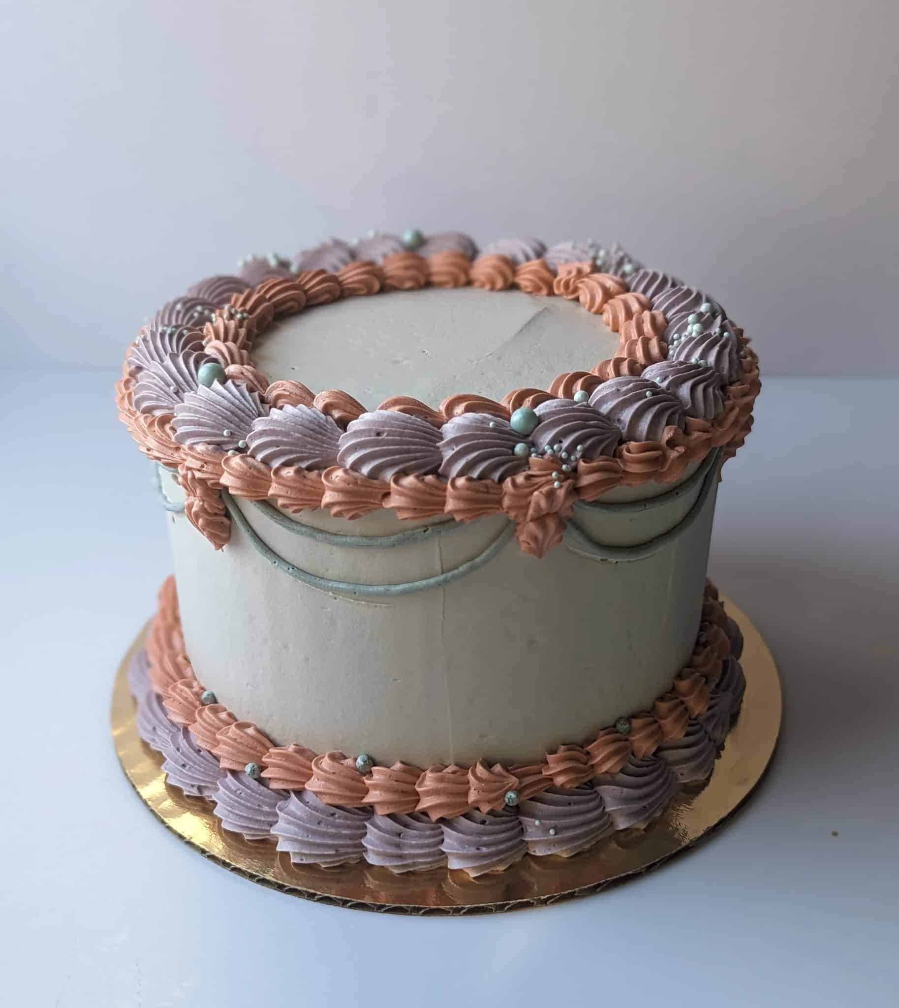 A bouquet of flowers is sitting on a checkered table.