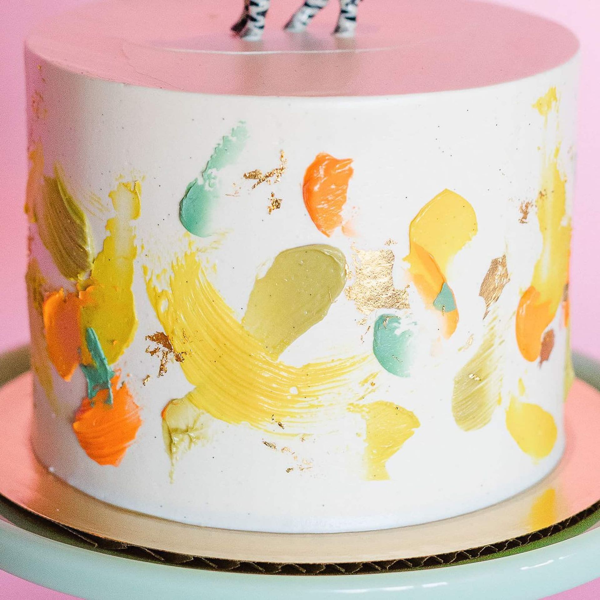 A woman in a white dress is holding a bouquet of flowers.