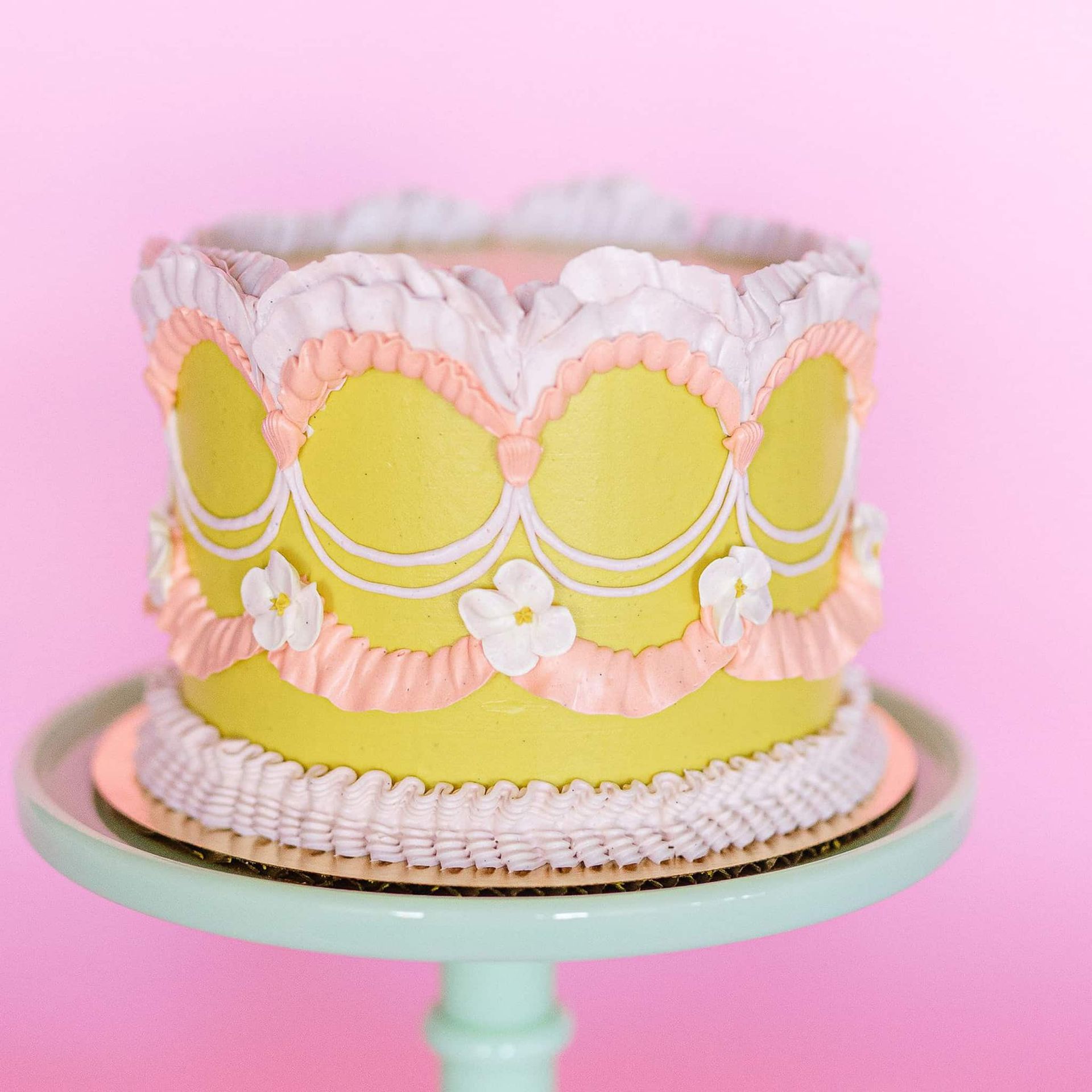 A bouquet of white flowers is sitting on a couch.