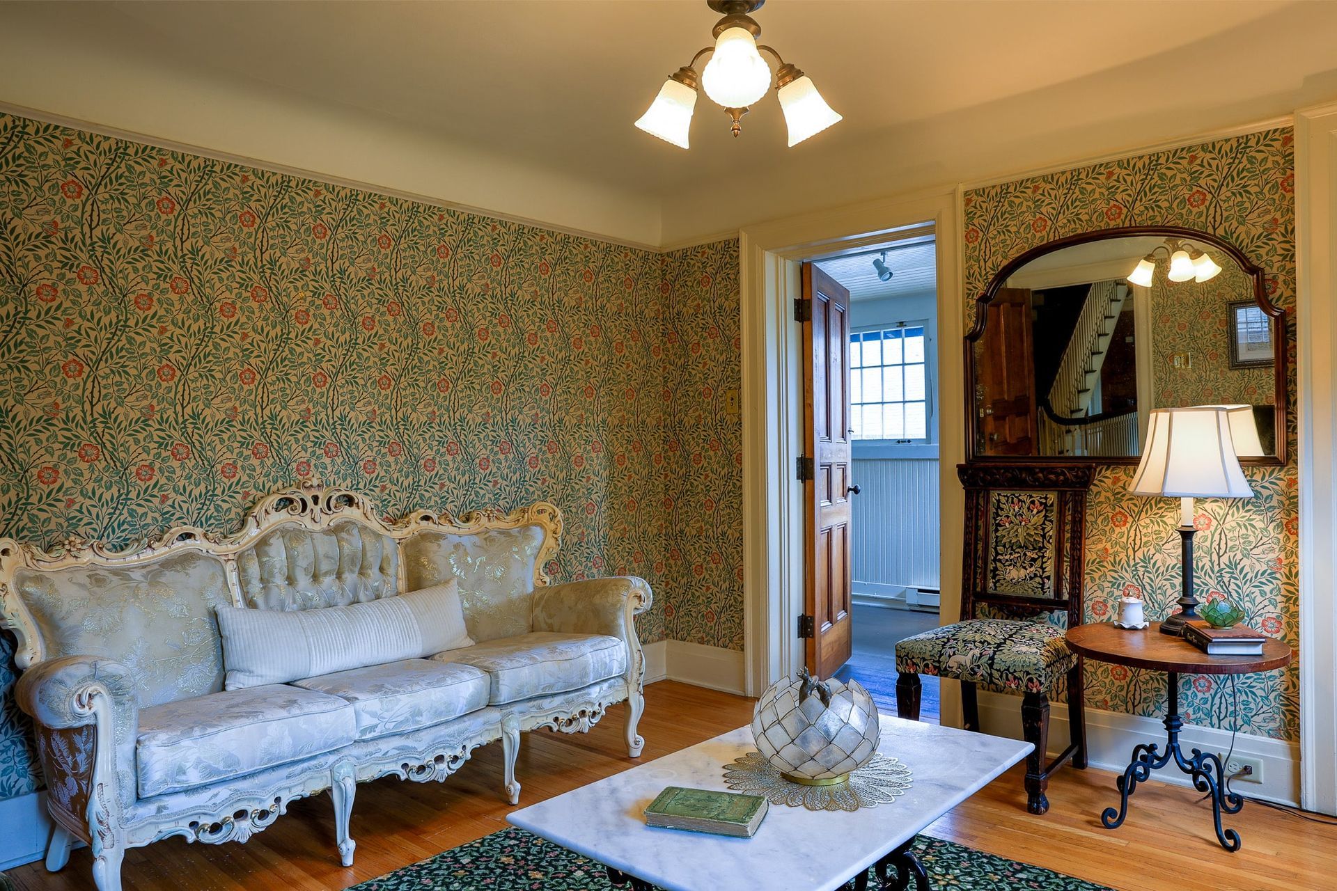 A living room with a couch and a coffee table