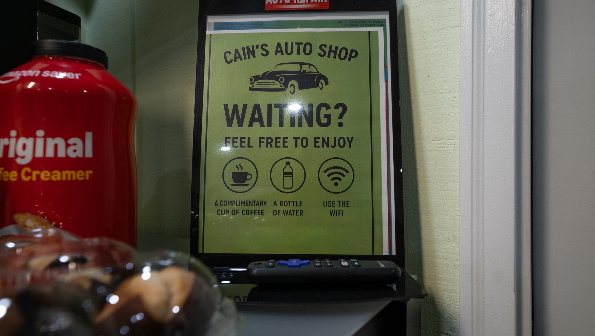 Sign for Cain's Auto Shop offering coffee, water, and Wi-Fi. | Cain's Auto Shop