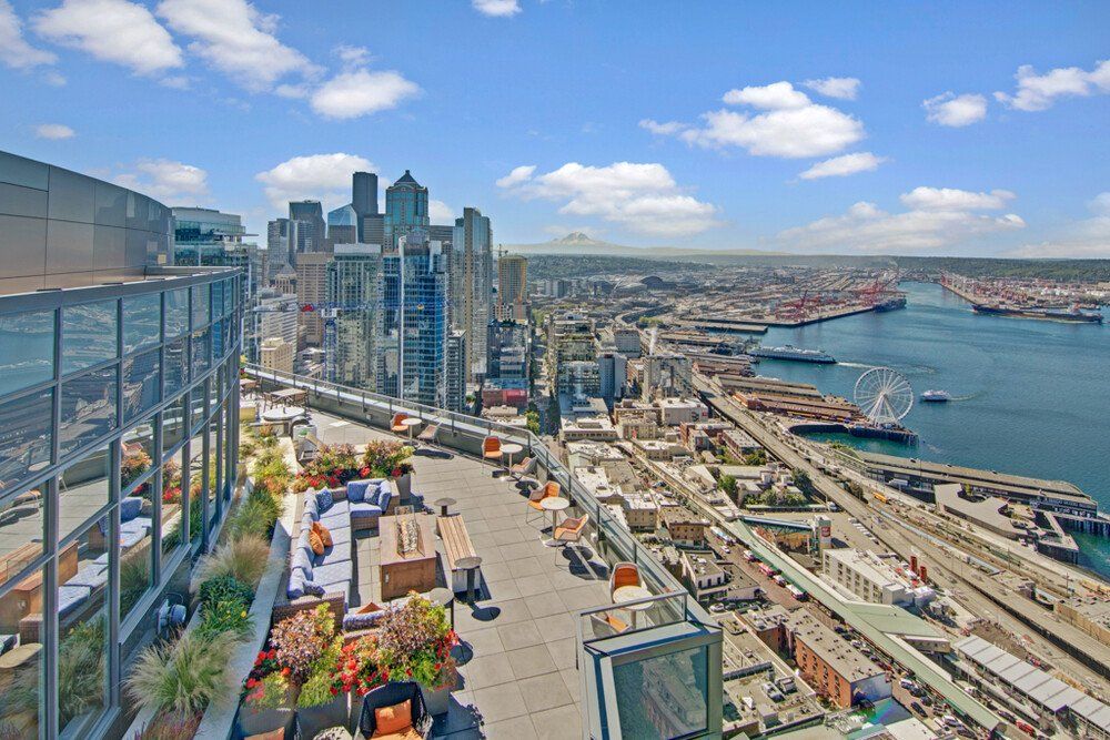 A view of a city from the top of a building.
