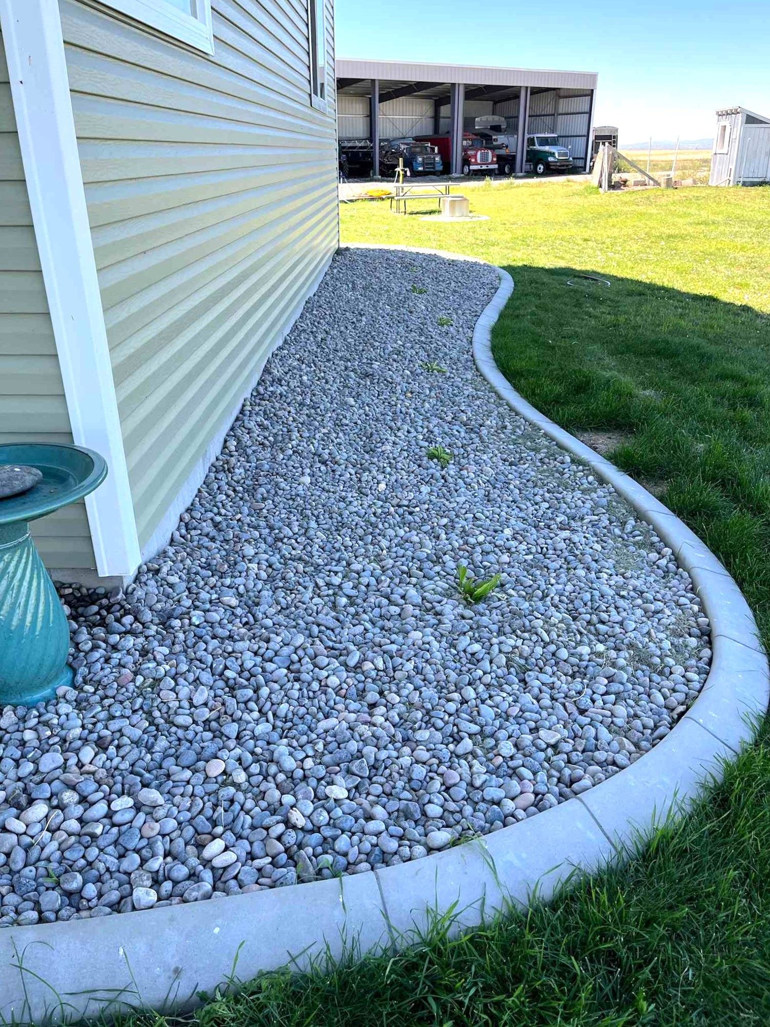 Concrete curbing around flowerbed
