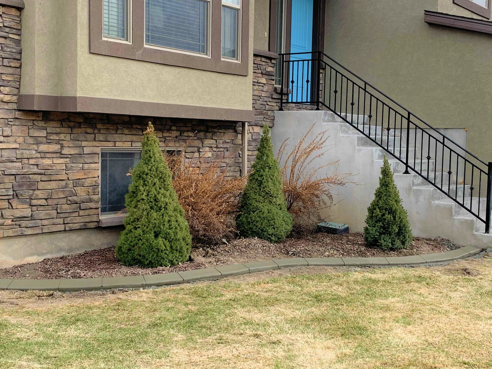 Smooth Finish curbing around flowerbed in Rigby ID