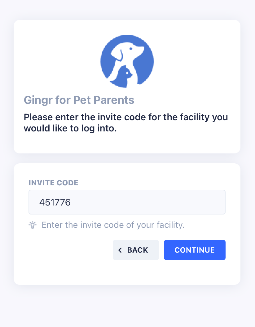 Dog with tan and white fur laying on green grass with a blue toy and a yellow toy. Dog with tan and white fur laying on green grass with a blue toy and a yellow toy.