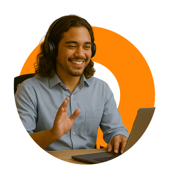 Woman with headphones smiling, working on laptop at a desk with an orange circle background.