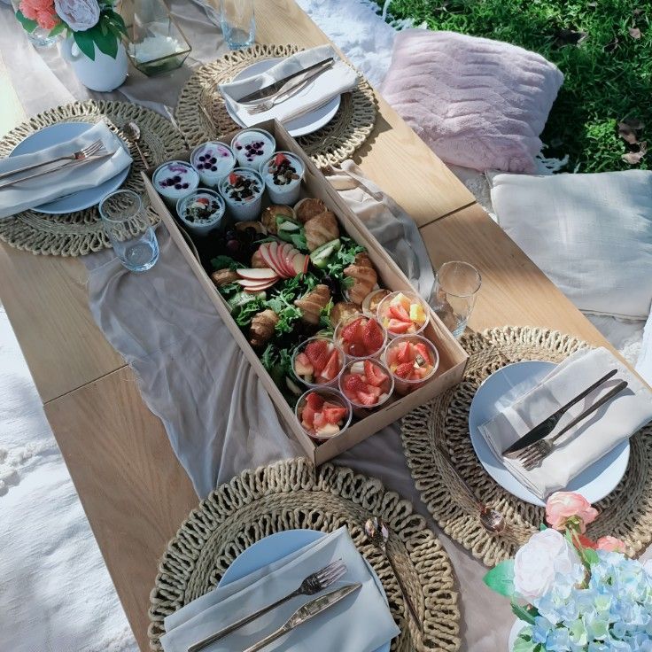 A Wooden Tray Filled With Fried Food on a Table — Darwin Catering Company in Brinkin, NT