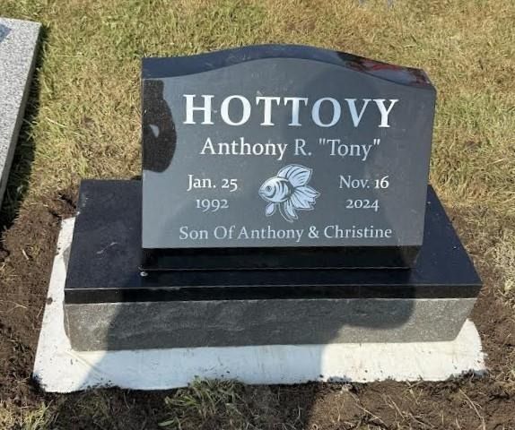 Black granite headstone with 