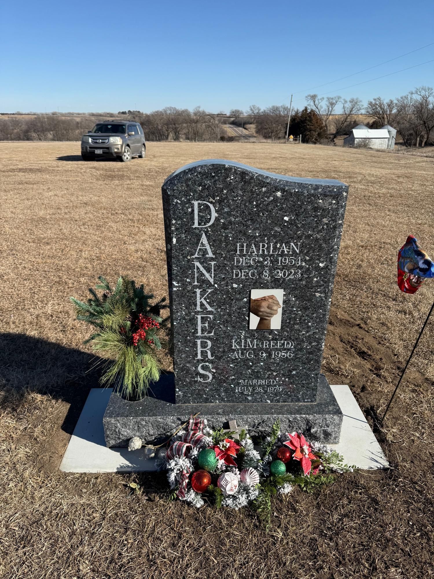 Grave marker with photo, name 