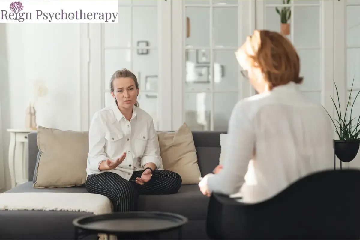 Woman discussing eating disorder concerns with a therapist during a counseling session.