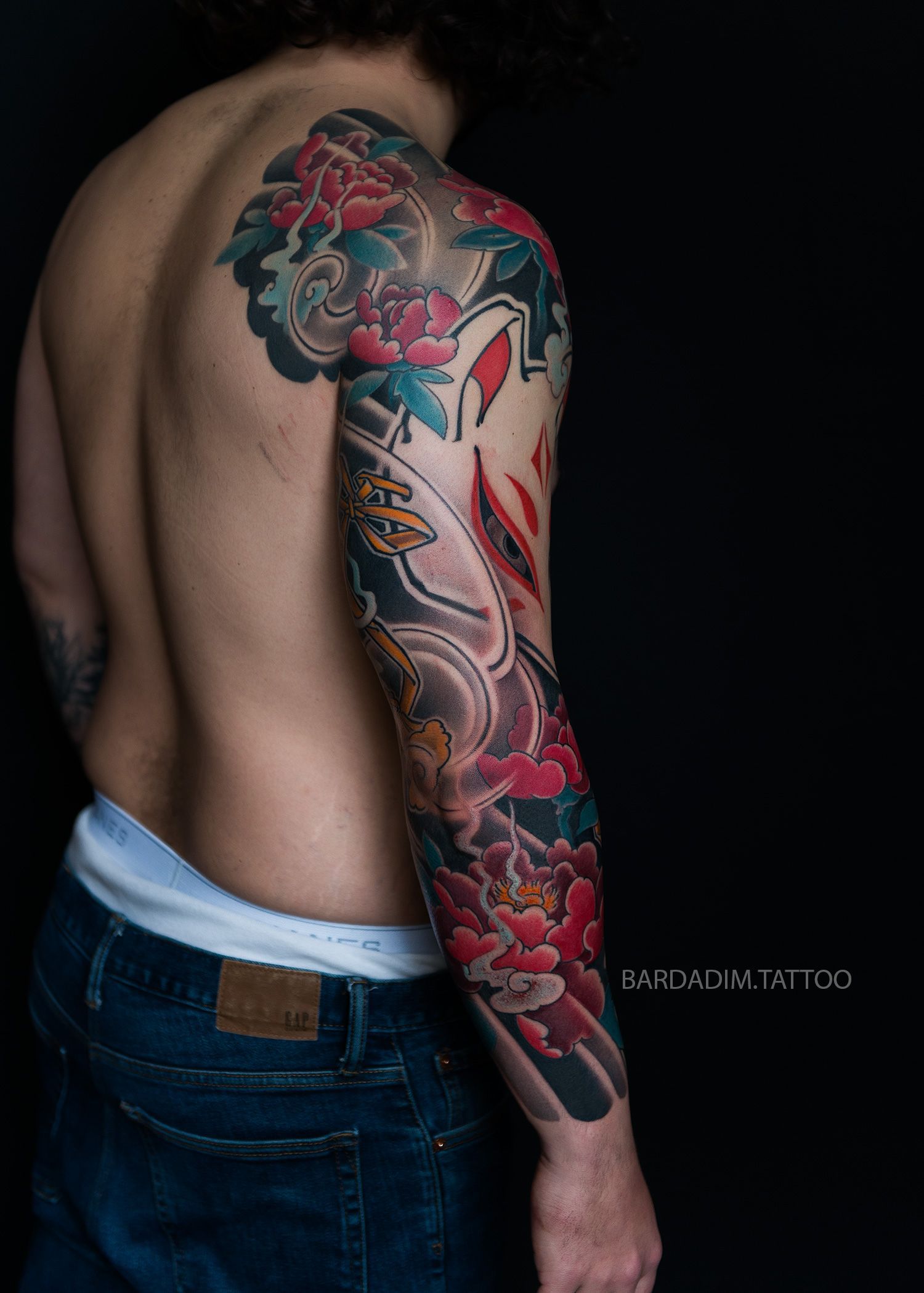 Kitsune mask Japanese tattoo with peony flowers, full sleeve side view, traditional irezumi style tattoo