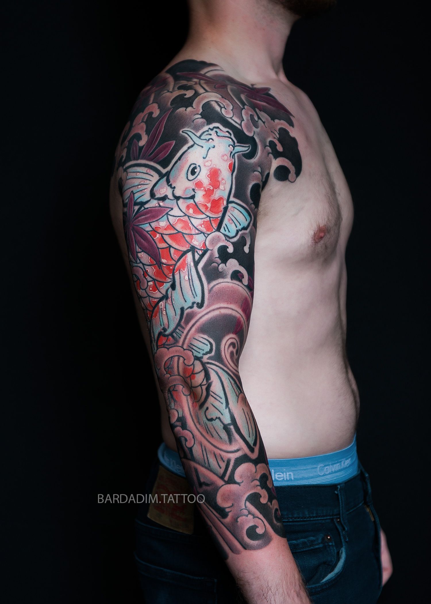 Orange koi irezumi sleeve tattoo side view