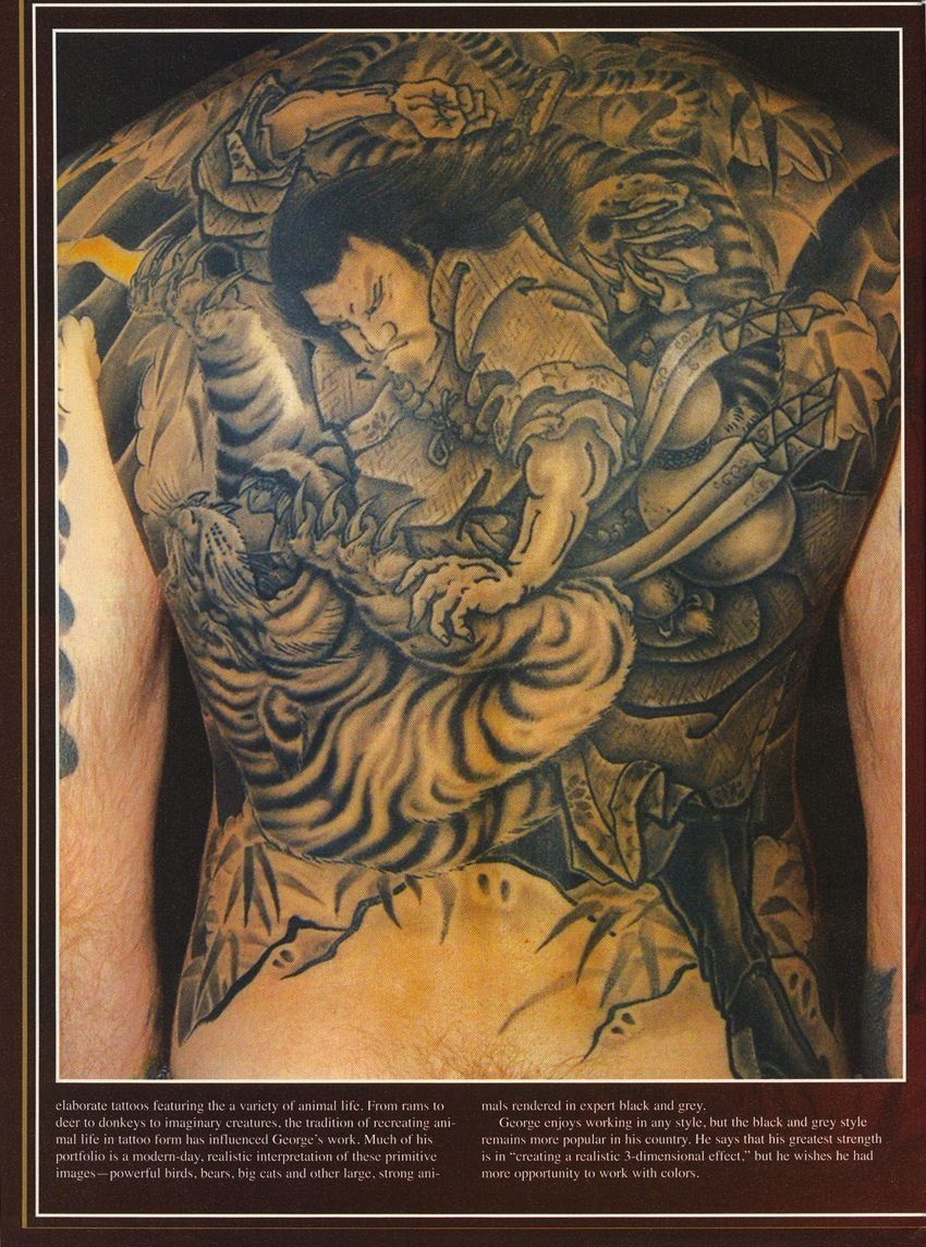 A picture of a man with a tattoo on his back
