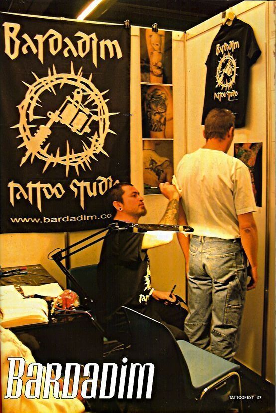 A man is getting a tattoo at a bardadim tattoo studio