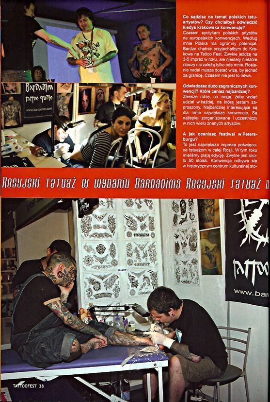 A man is getting a tattoo on another man 's leg