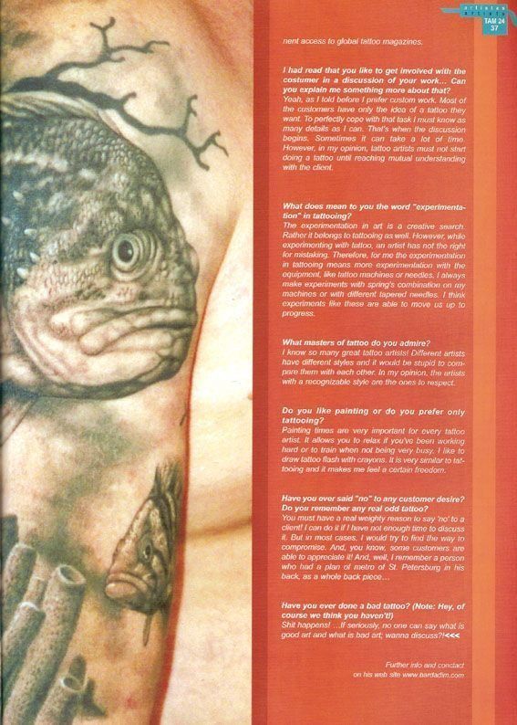A man has a tattoo of a fish on his arm