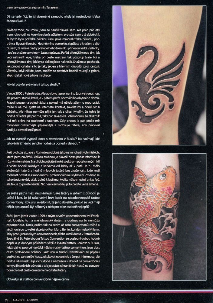 A page of a magazine with a tattoo of a swan on a person 's leg