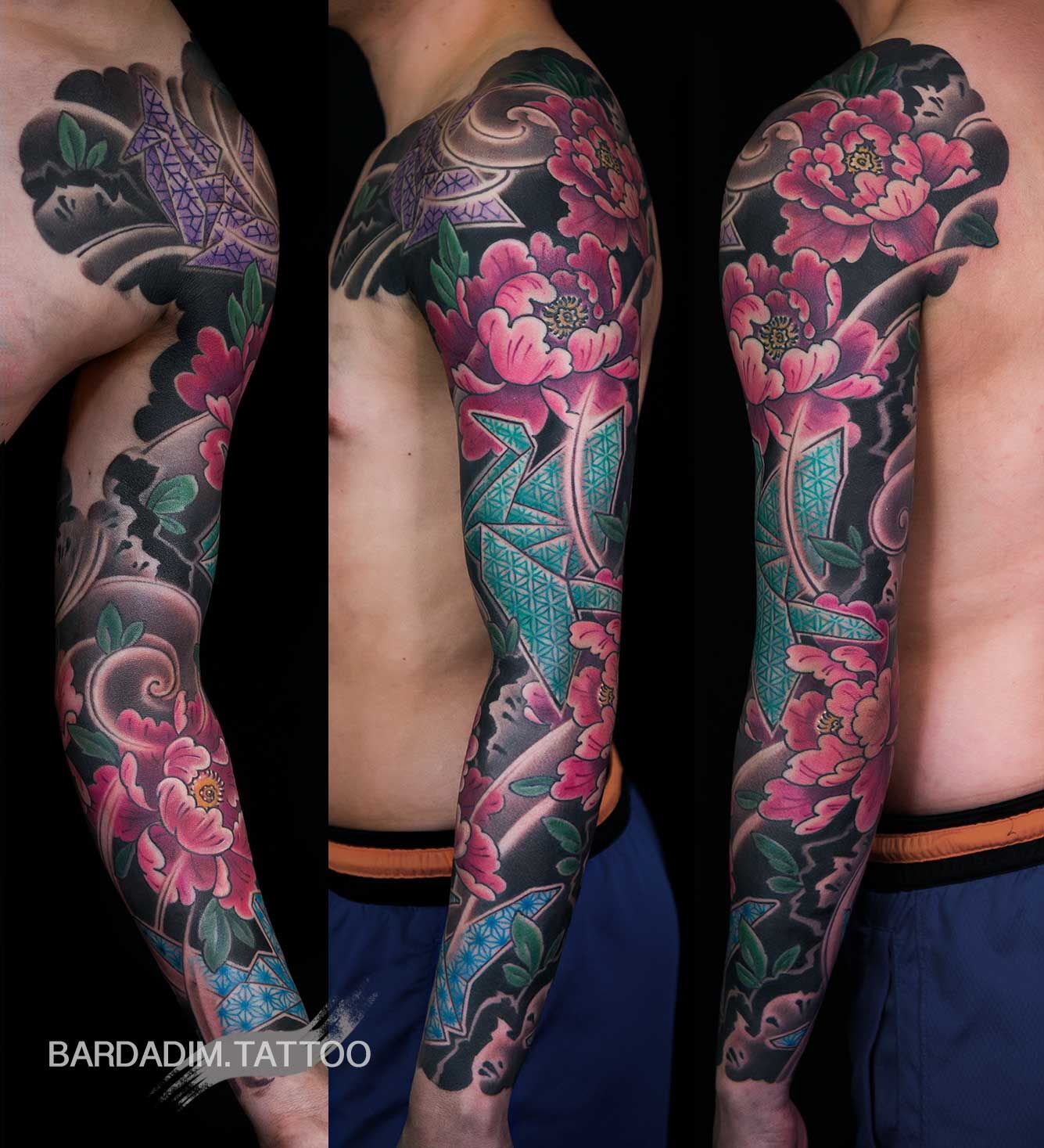 Full arm tattoo: pink peonies, turquoise leaves, black waves and purple bird.