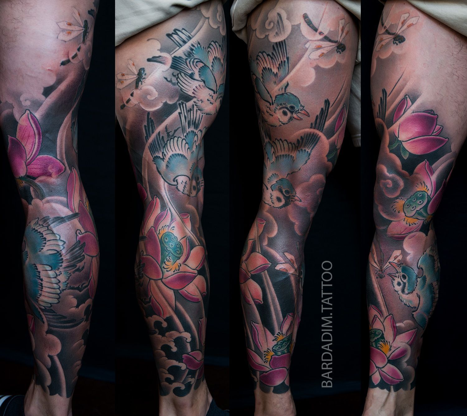 Leg tattoo with pink lotus flowers, blue birds, and clouds against a black background.