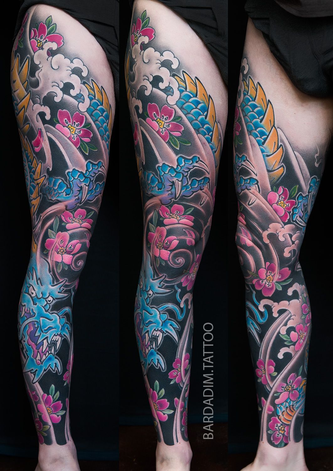 Full-sleeve tattoo with a Japanese theme, featuring lotus flowers, koi fish, birds, clouds, and waves.