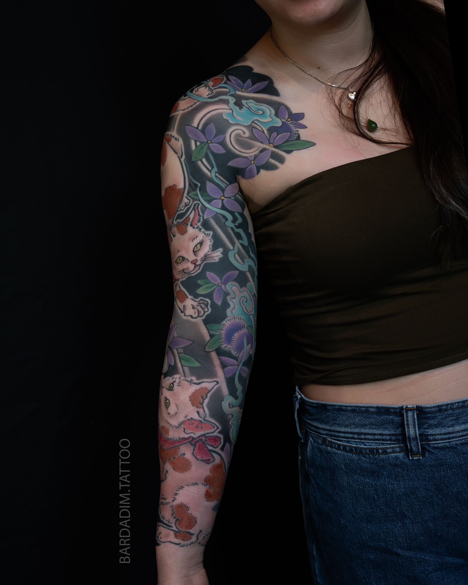 Full sleeve Japanese tattoo front view with monster cats and fireballs