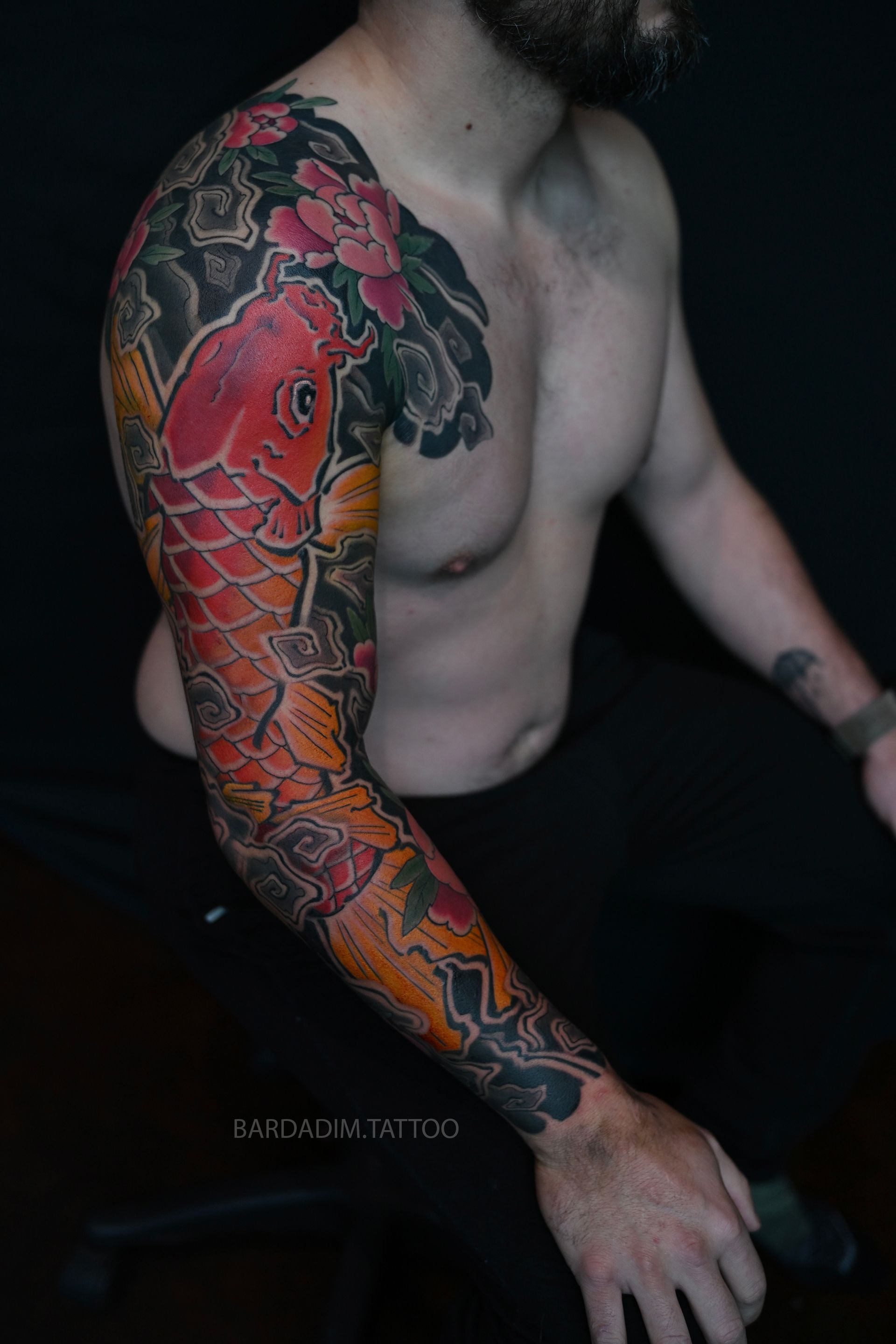 Full orange koi and peony Japanese sleeve three quarter view