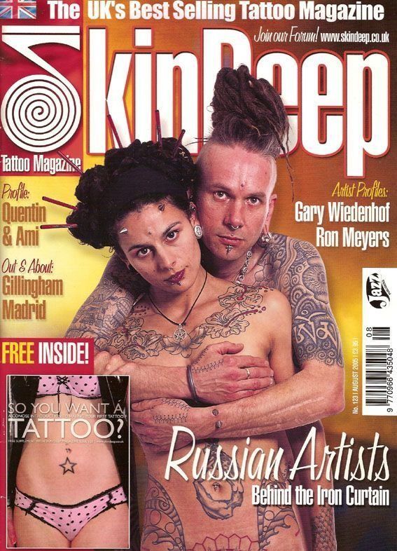 A man and a woman are on the cover of a tattoo magazine