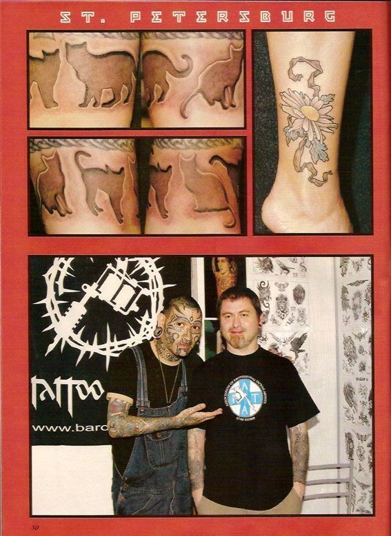 Two men standing next to each other in front of a tattoo shop