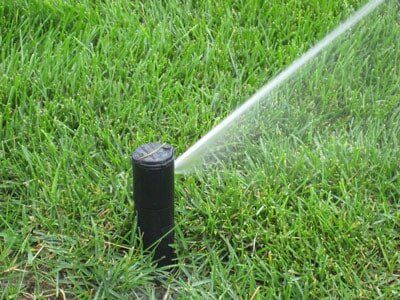 Small Sprinkler — Small Sprinkler in Grass in Omaha, NE