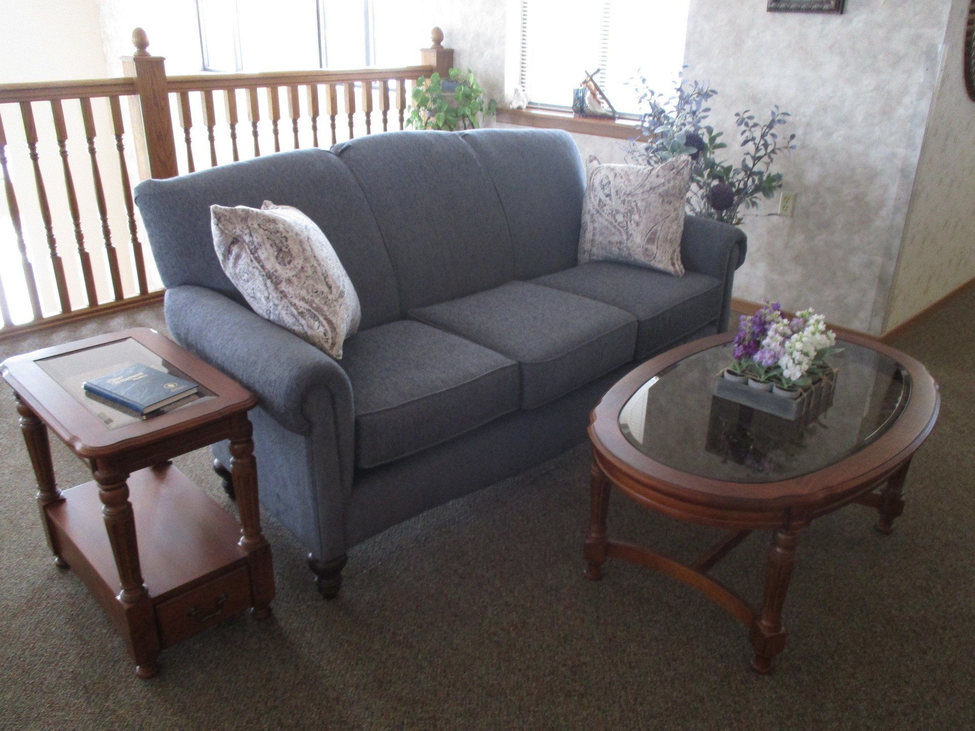 A living room with a couch and a coffee table