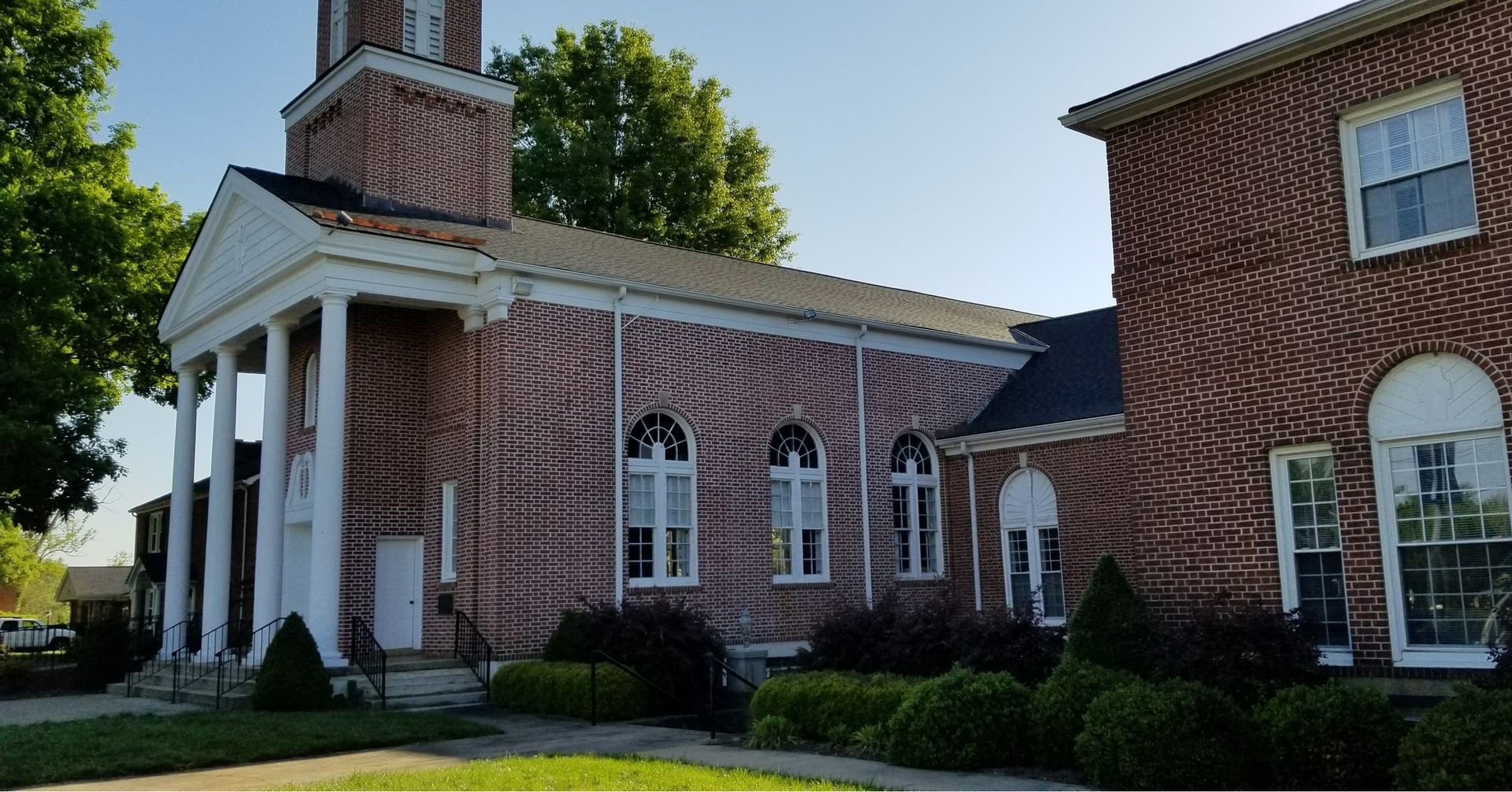A large brick building with a clock tower on top of it
