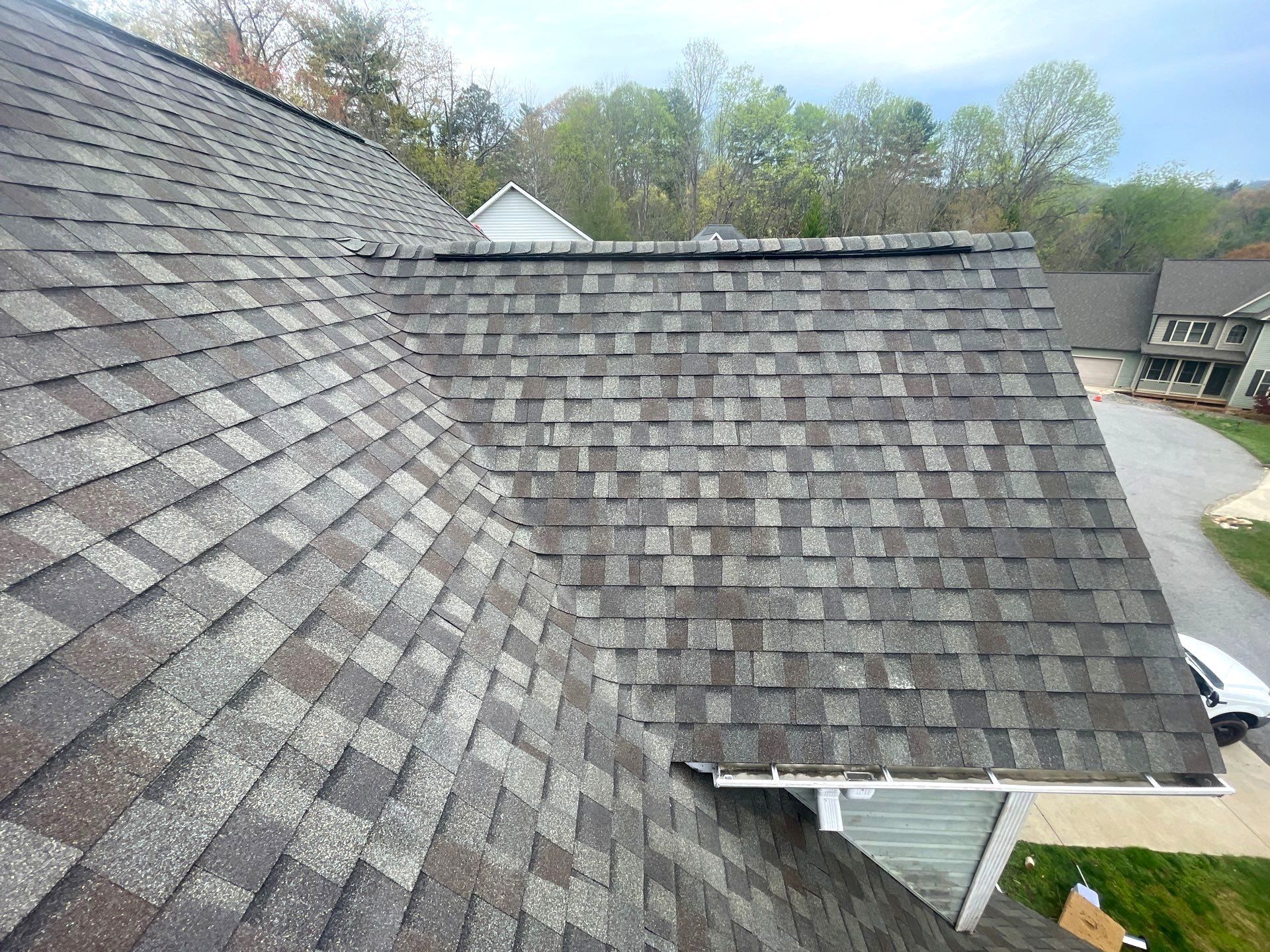 The roof of a house with a lot of shingles on it.