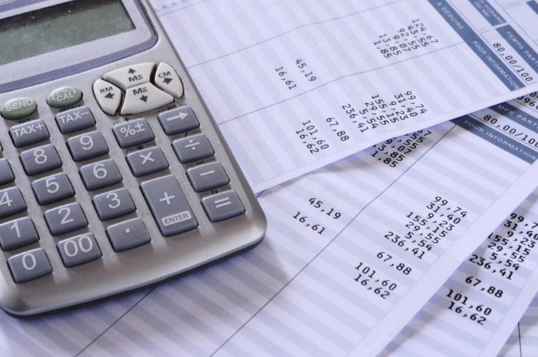 Calculator Over Payroll Slip — Birmingham, AL — Allen D. Arnold Attorney at Law