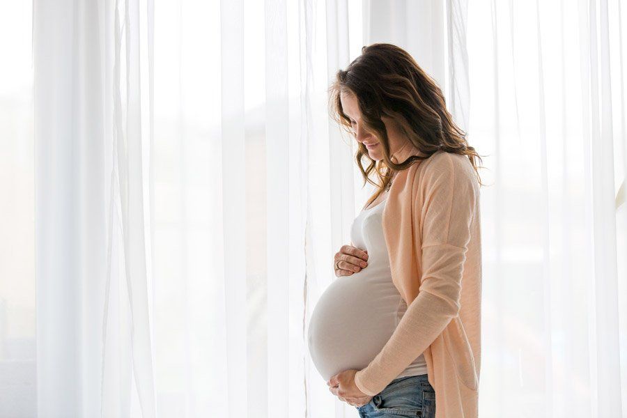 Portrait of Young Pregnant — Birmingham, AL — Allen D. Arnold Attorney at Law