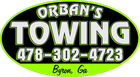 Orban's Towing logo: green and black oval with white text and phone number, "Byron, GA" at the bottom.