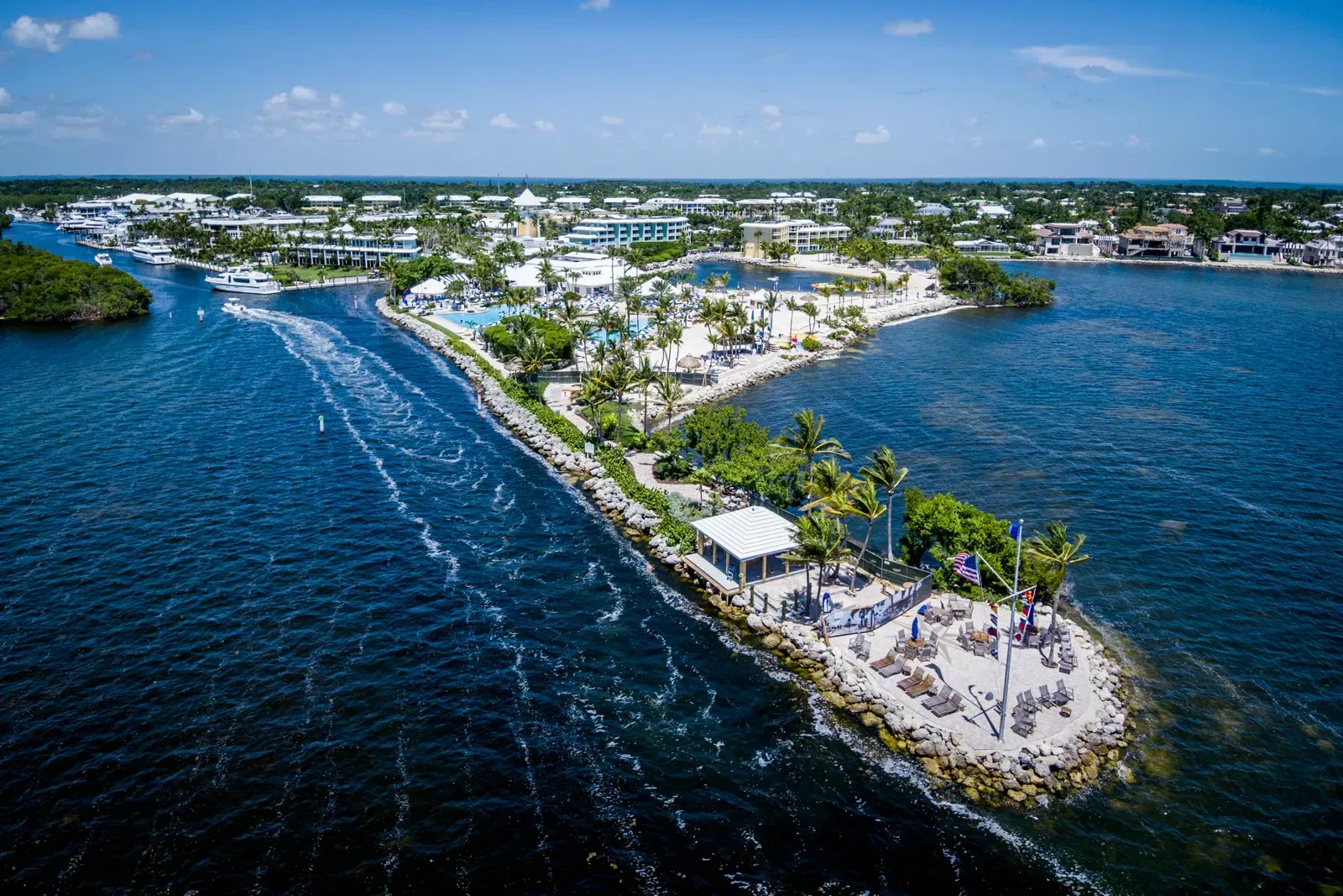 An aerial view of a golf course with a river running through it