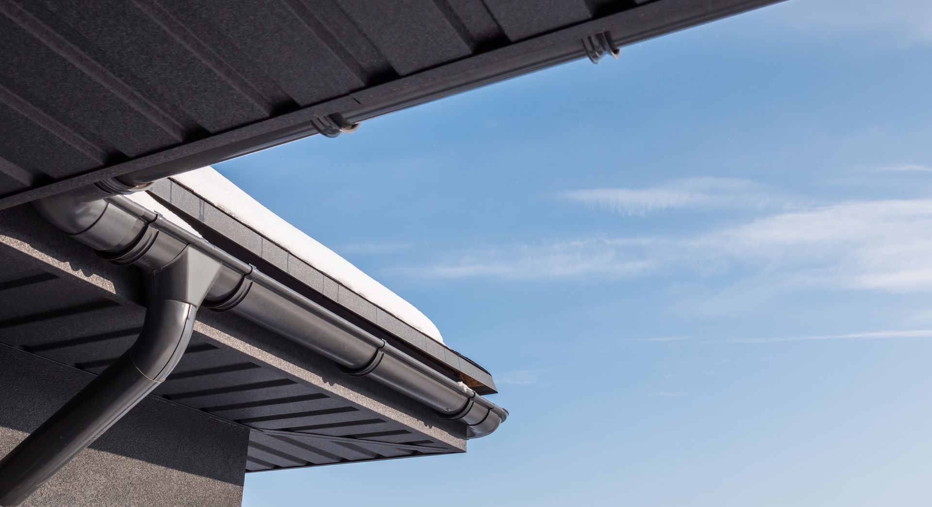 The corner of the roof with a drainage system